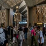 Visitors tour the new Grand Egyptian Museum in Giza on the outskirts of Cairo. The museum has started welcoming guests after years of delays, with an official opening scheduled for July. (Khaled Desouki / AFP via Getty Images)