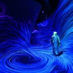 A woman visits the newly opened teamLab Phenomena, an immersive art experience museum newly opened in Abu Dhabi’s Saadiyat Cultural District. (Giuseppe Cacace /AFP via Getty Images)