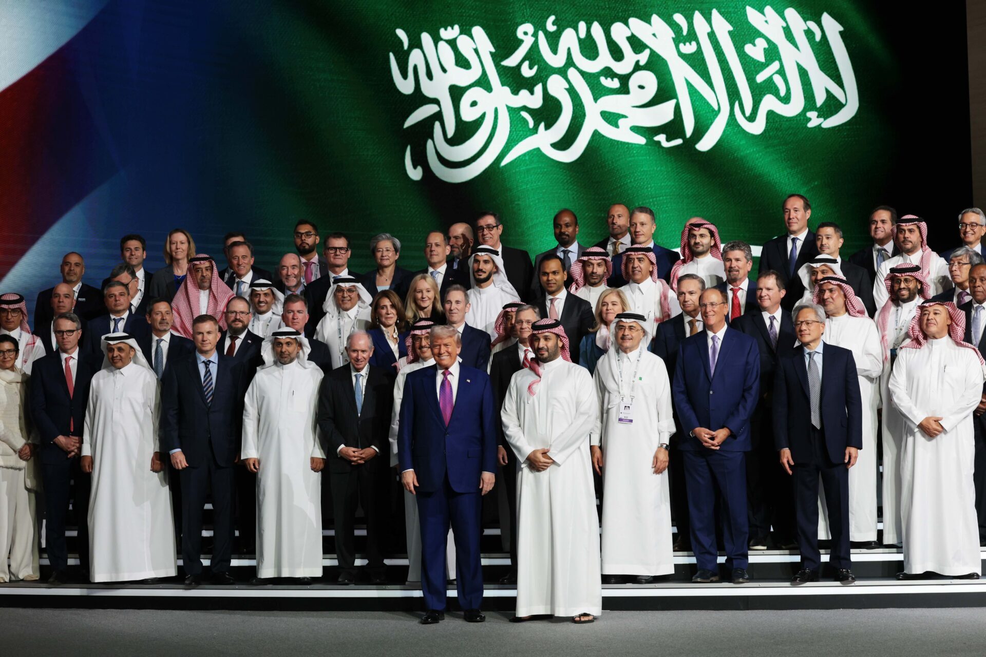U.S. President Donald Trump and Saudi Crown Prince Mohammed bin Salman pose for a photo with business leaders including Nvidia CEO Jensen Huang and Alphabet chief investment officer Ruth Porat at the King Abdul Aziz International Conference Center while attending a Saudi-U.S. business investment forum in Riyadh on Tuesday. (Win McNamee/Getty Images)
