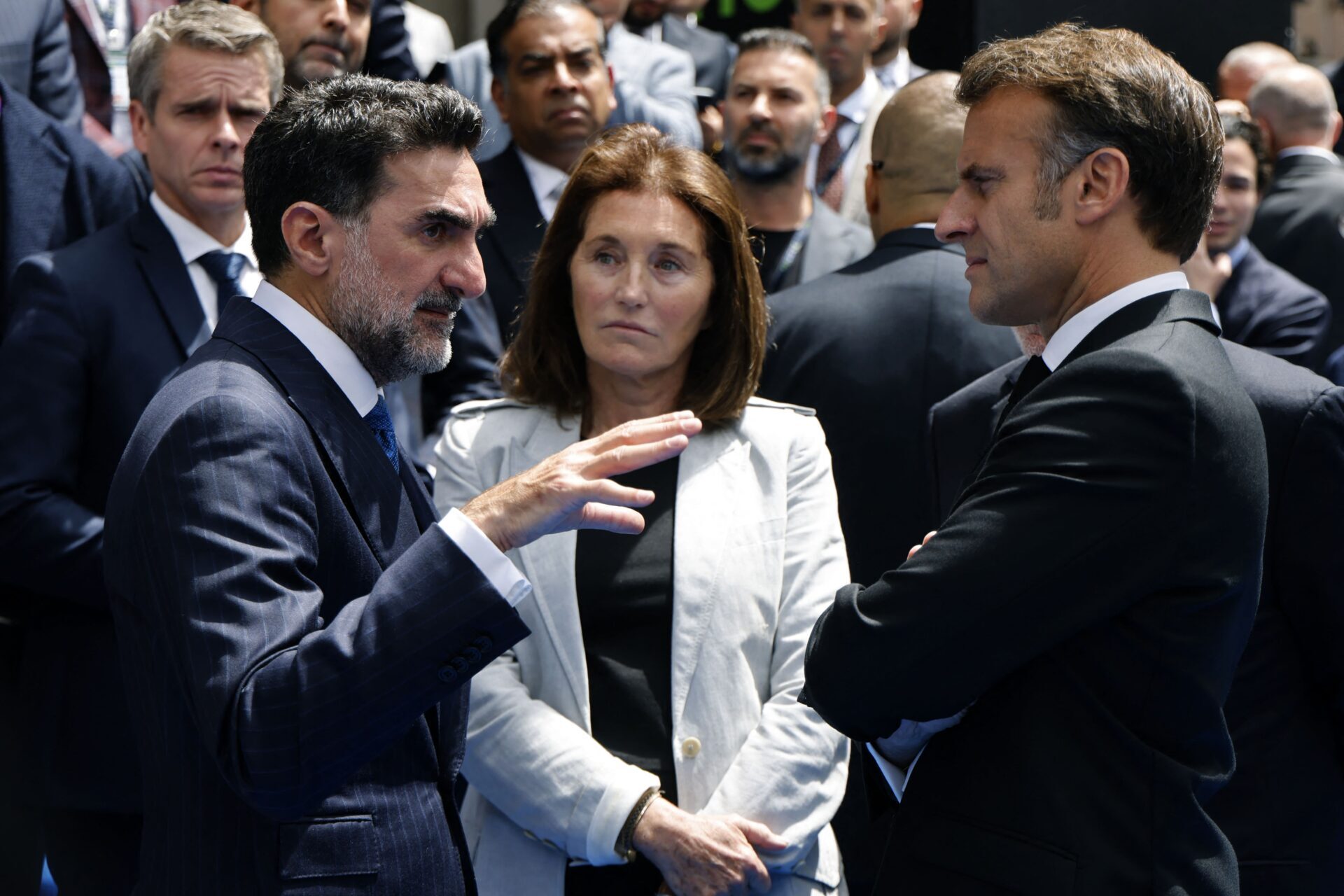 Yasir Al-Rumayyan, Governor of Saudi Arabia’s Public Investment Fund and Chairman of the FII Institute (left), meets with French President Emmanuel Macron following the FII Priority Europe Summit in the Albanian capital of Tirana on Saturday. (Ludovic Marin / AFP via Getty Images)