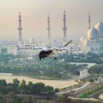 Archer Aviation's Midnight aircraft is tested in the skies above Abu Dhabi, with Sheikh Zayed Grand Mosque in the background. (Archer Aviation)