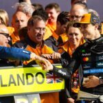 Prince Salman bin Hamad Al Khalifa, Bahrain’s Crown Prince and Prime Minister, greets Oscar Piastri of Australia and team McLaren in the pit lane during Britain’s F1 Grand Prix at Silverstone Circuit on Sunday. (Jayce Illman/Getty Images)