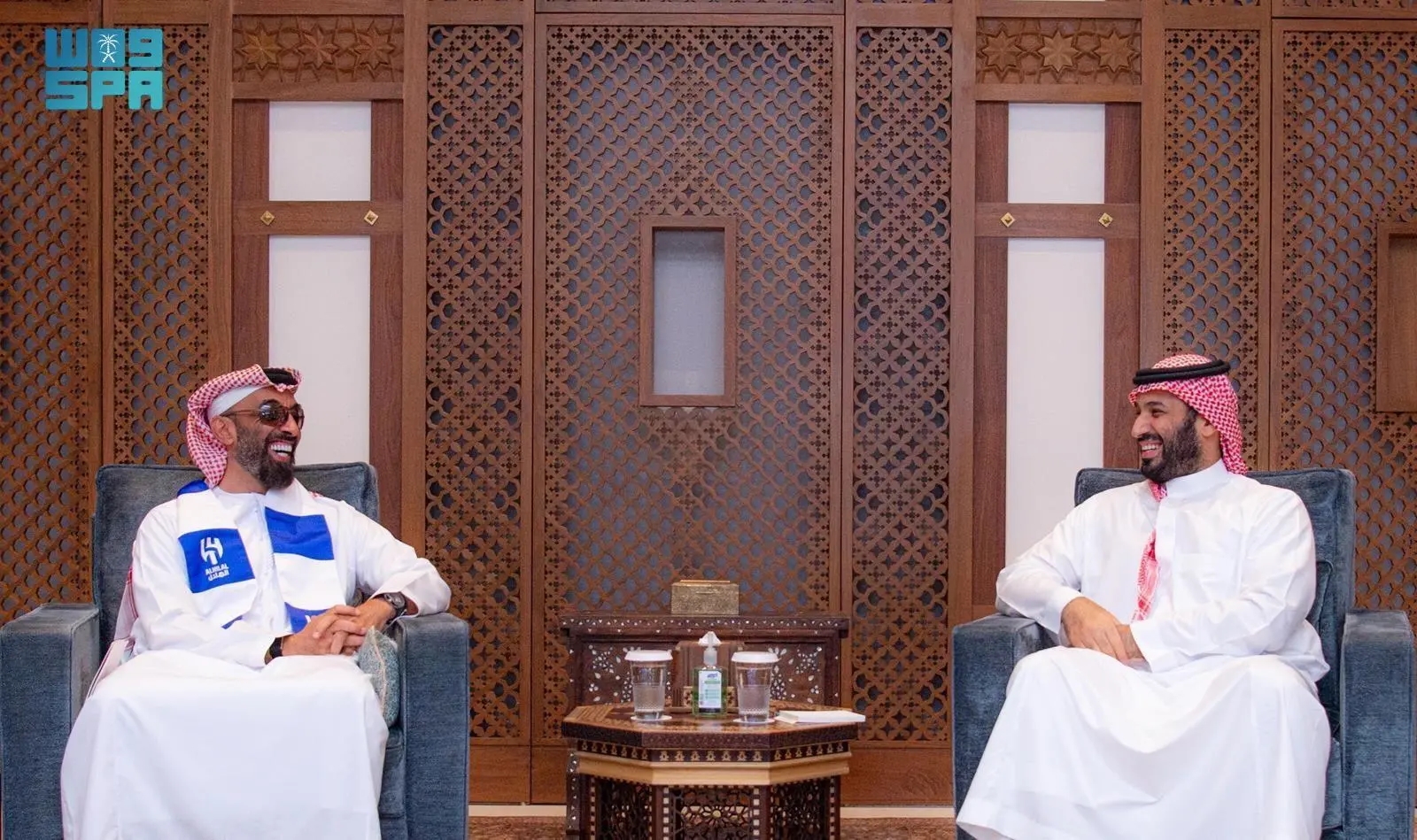 Sheikh Tahnoon bin Zayed, UAE National Security Advisor, paid a visit to Saudi Crown Prince Mohammed bin Salman at Al-Salam Palace in Jeddah on Thursday. In a show of sportsmanship, Sheikh Tahnoon wore the scarf of the kingdom’s Al Hilal soccer team, which knocked Manchester City, the team owned by Sheikh Mansour bin Zayed, Sheikh Tahnoon’s brother and the UAE Vice President, out of the FIFA Club World Cup 2025 on Monday. (Saudi Press Agency)