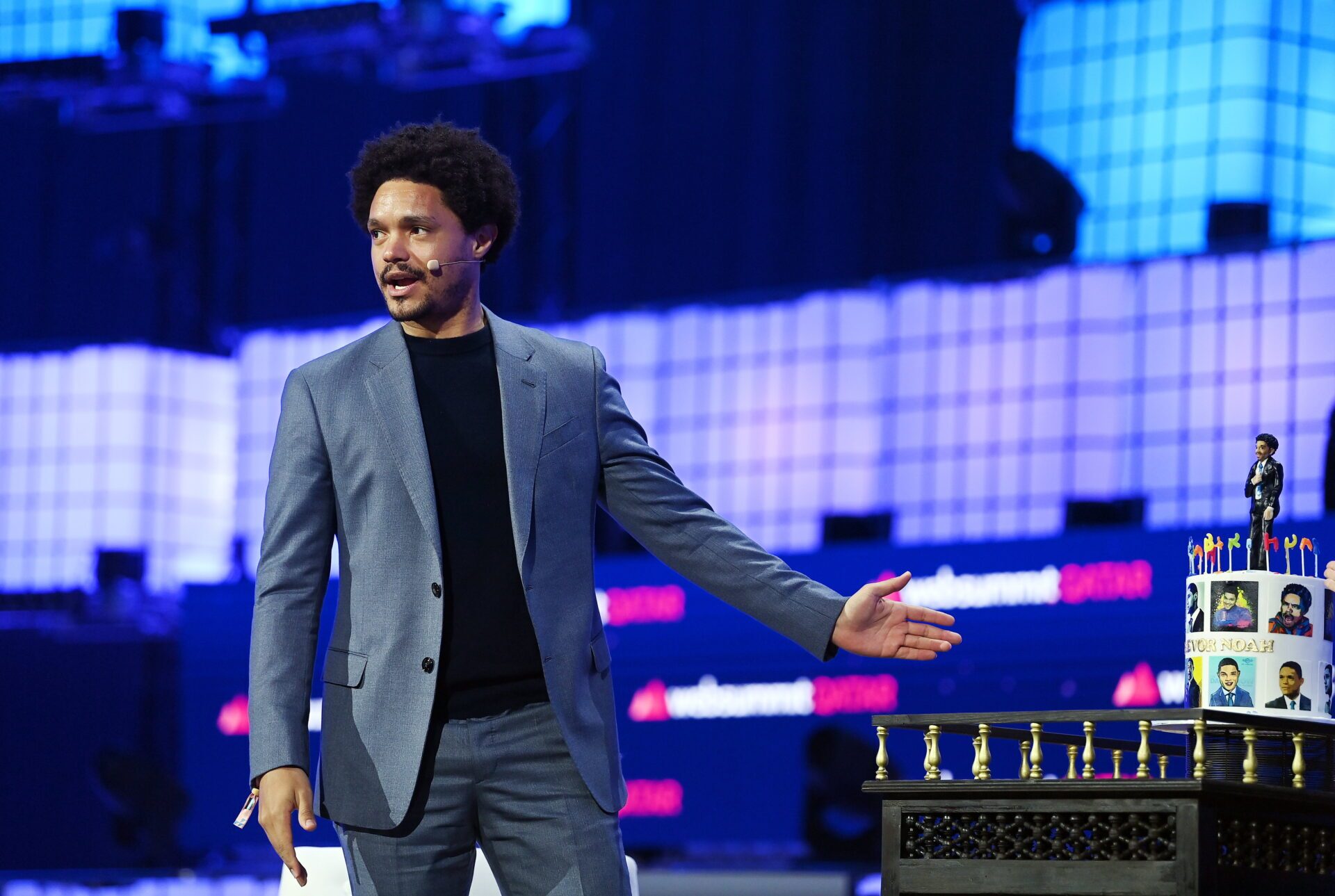 Trevor Noah appears onstage at Web Summit Qatar. (Photo: Getty Images)
