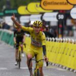 Slovenian cyclist Tadej Pogacar of UAE Team Emirates - XRG celebrates his fourth overall Tour de France victory at the finish line of Stage 21 at the Champs-Elysees in Paris on Sunday. (Photo by Sara Cavallini/Getty Images)